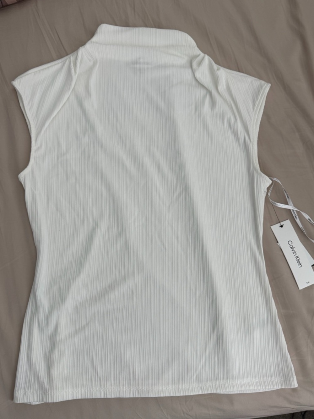 Women’s  Cream Calvin Klein high neck blouse. Size: M. NWT.